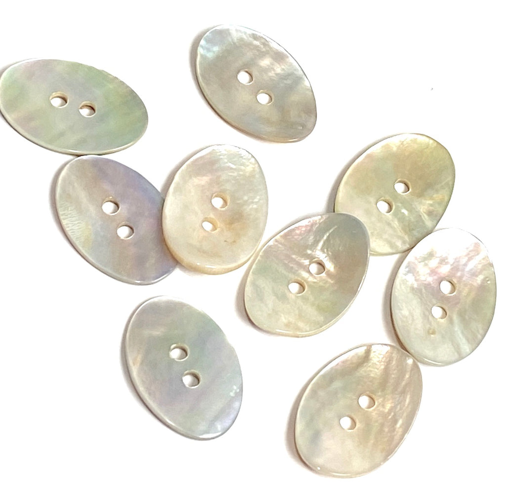 1 White Pearl Shell Round Buttons, Pack of 4. Item #655A – The Button Bird