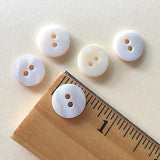 Re-Stocked, Natural White River Shell / Butterscotch Tiger Reverse Side, 1/2" 2-hole Button, Pack of 8 #0021