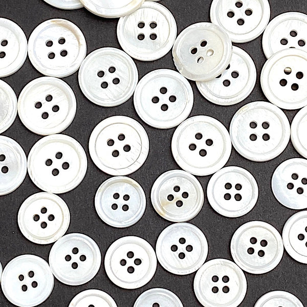 116-120 Buttons: White River Shell Size Mix: 4-Hole.  3/8", 9/16", 5/8", 13/16".   # LP-111