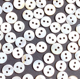 Bulk Special, White, Some with Butterscotch Backs 3/8" River Shell 2-Hole 9mm Button, Pack of 500   # LP-68/500