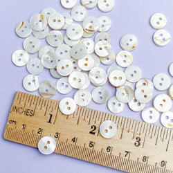 Bulk Special, White, Some with Butterscotch Backs 3/8" River Shell 2-Hole 9mm Button, Pack of 500   # LP-68/500