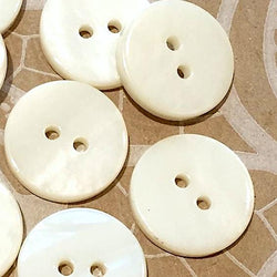 Re-Stocked, Ivory / Off-White River Shell 5/8" 2-hole Button, Pack of 8 for $8.00  #1771